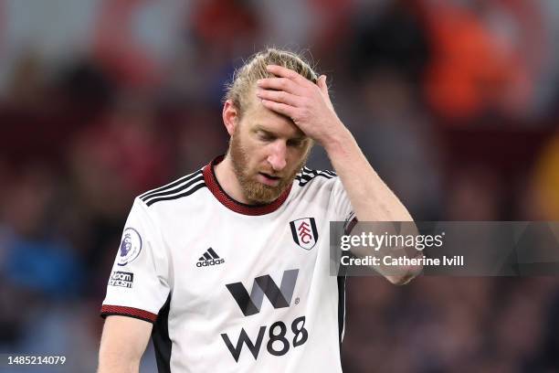 Tim Ream of Fulham looks dejected after the team's defeat during the Premier League match between Aston Villa and Fulham FC at Villa Park on April...