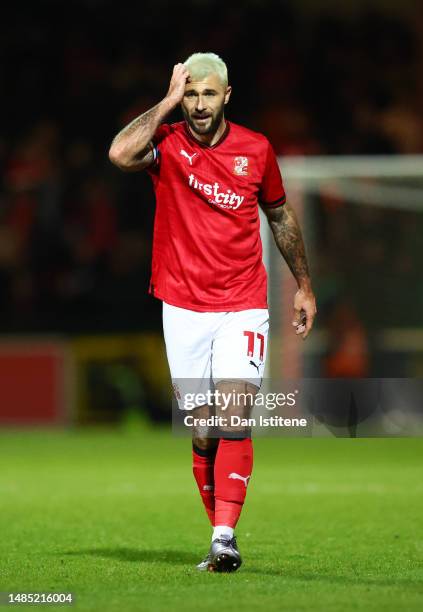 Charlie Austin of Swindon reacts during the Sky Bet League Two between Swindon Town and Stevenage at County Ground on April 25, 2023 in Swindon,...