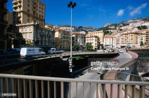 monte carlo street scene, view from cross highway walkover. - monaco cars stock pictures, royalty-free photos & images