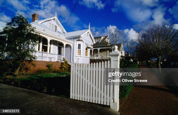 weatherbord house with white picket gate at herne bay. - white picket gate stock pictures, royalty-free photos & images