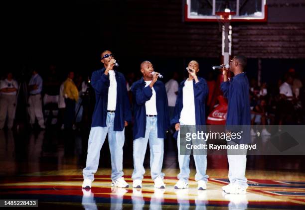 Singers Daron Jones, Michael 'Mike' Keith, Marvin 'Slim' Scandrick and Quinnes 'Q' Parker of 112 performs the national anthem during the '1st Annual...