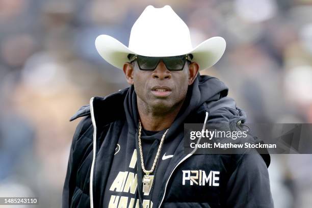 Head coach Deion Sanders of the Colorado Buffaloes watches as his team warms up prior to their spring game at Folsom Field on April 22, 2023 in...