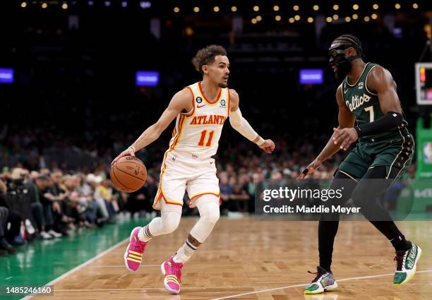 Trae Young of the Atlanta Hawks drives to the basket against Jaylen Brown of the Boston Celtics during the first quarter in game five of the Eastern...