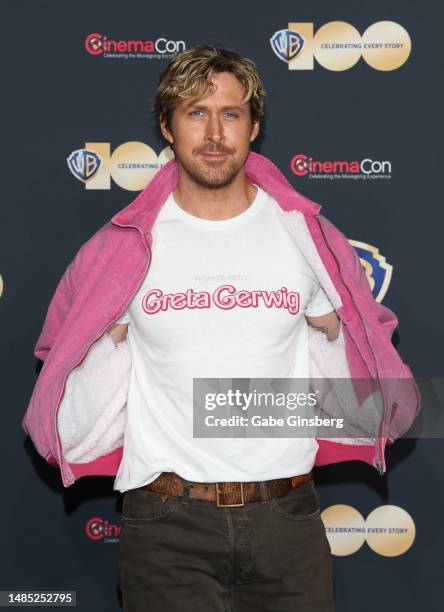 Ryan Gosling poses for photos as he promotes the upcoming film "Barbie" during the Warner Bros. Pictures presentation at The Colosseum at Caesars...