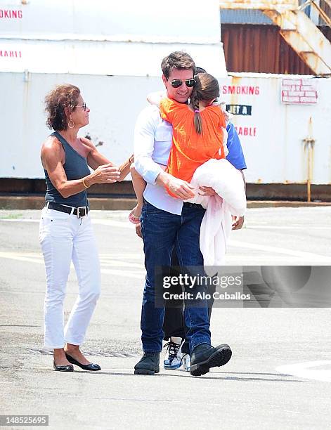 Tom Cruise and Suri Cruise are seen at west side heliport in Manhattan on July 18, 2012 in New York City.