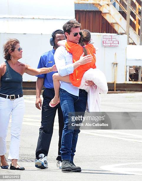 Tom Cruise and Suri Cruise are seen at west side heliport in Manhattan on July 18, 2012 in New York City.
