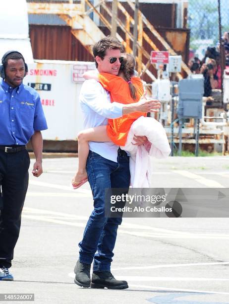 Tom Cruise and Suri Cruise are seen at west side heliport in Manhattan on July 18, 2012 in New York City.