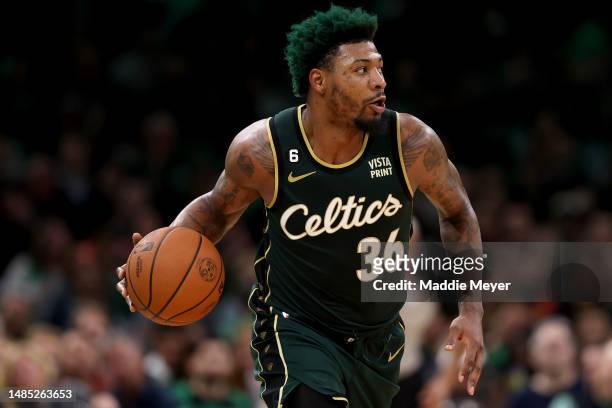 Marcus Smart of the Boston Celtics dribbles against the Atlanta Hawks during the third quarter in game five of the Eastern Conference First Round...