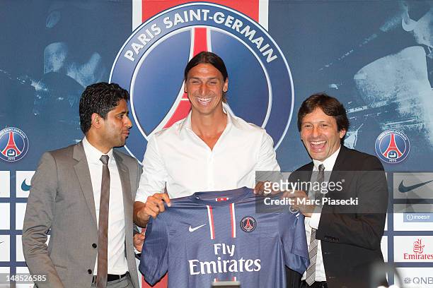Nasser Al Khelaifi and Leonardo Nascimento de Araujo ( welcome Zlatan Ibrahimovic during the press conference for Paris Saint Germain at Parc des...