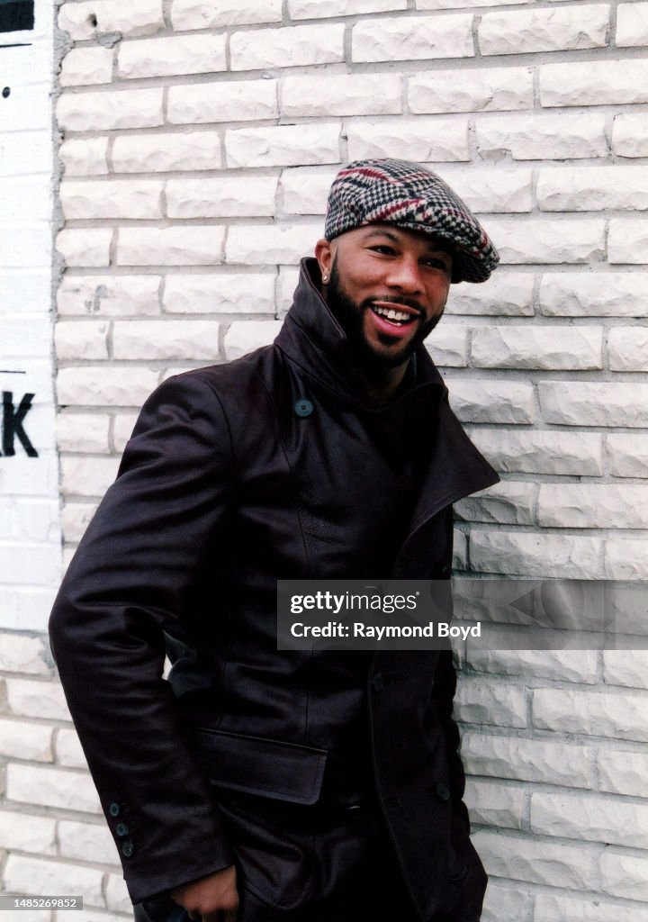 Common Teeth Rapper Rapper Common poses for photos during a break in filming his video ...