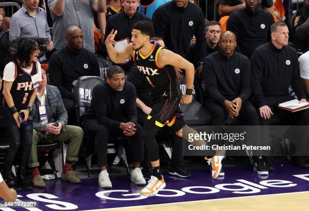 Devin Booker of the Phoenix Suns reacts during the first quarter against the LA Clippers in game five of the Western Conference First Round Playoffs...