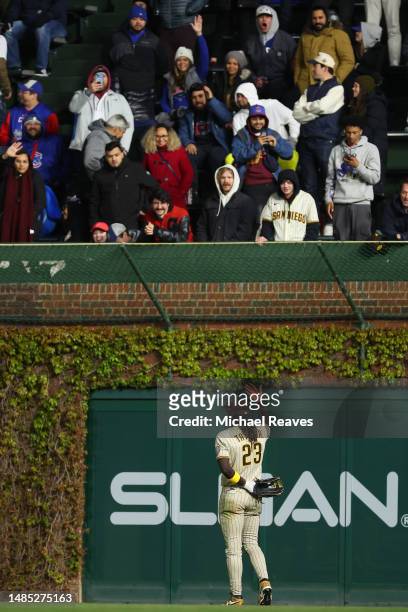 Fernando Tatis Jr. #23 of the San Diego Padres responds to taunts during the eighth inning against the Chicago Cubs at Wrigley Field on April 25,...