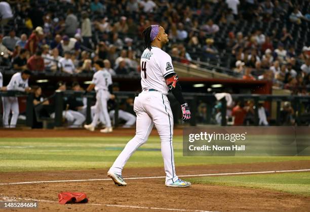 Ketel Marte of the Arizona Diamondbacks reacts after striking out during the seventh inning of a game against the Kansas City Royals at Chase Field...