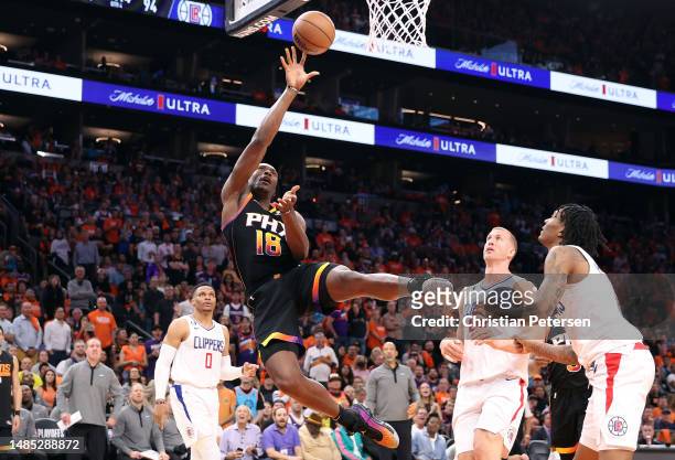 Bismack Biyombo of the Phoenix Suns shoots the ball after a flagrant foul by Bones Hyland of the LA Clippers during the fourth quarter in game five...