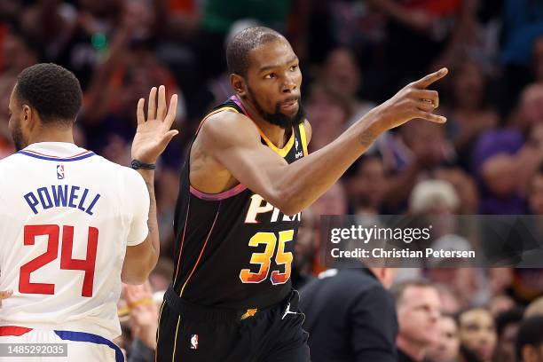 Kevin Durant of the Phoenix Suns reacts during the second quarter against the LA Clippers in game five of the Western Conference First Round Playoffs...