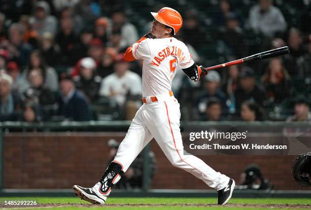 Mike Yastrzemski of the San Francisco Giants hits an RBI double, scoring Joc Pederson against the St. Louis Cardinals in the bottom of the ninth...