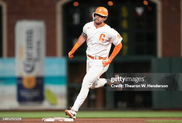 Blake Sabol of the San Francisco Giants rounds the bases on his a walk-off, two-run home run in the bottom of the ninth inning to defeat the St....