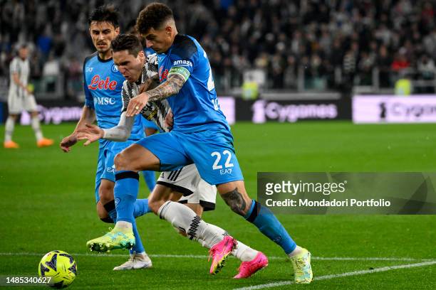 Eljif Elmas of SSC Napoli, Federico Chiesa of Juventus FC and Giovanni Di Lorenzo of SSC Napoli compete for the ball during the Serie A football...