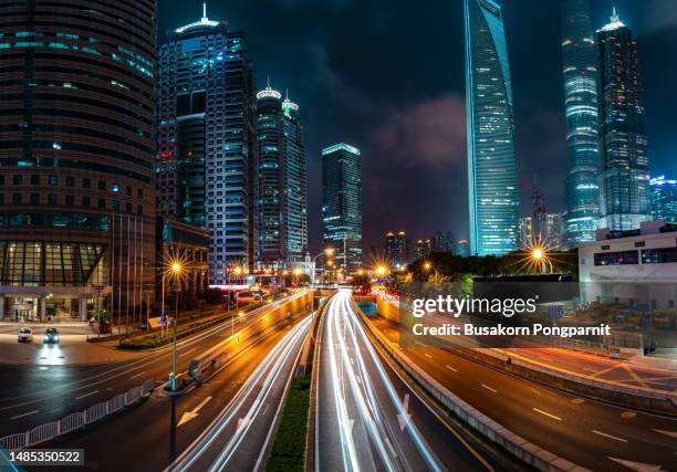 the urban traffic of shanghai city - middle stock pictures, royalty-free photos & images