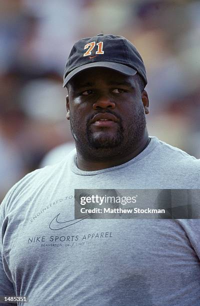 Hunter of the U.S. Looking on during the Men's Shot Put Finals of the 2000 U.S. Olympic Track & Field Team Trials at the Hornet Stadium in...