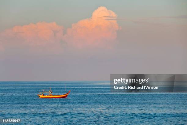 fishing boat at sunrise, pantai kok. - pantai kok stock pictures, royalty-free photos & images