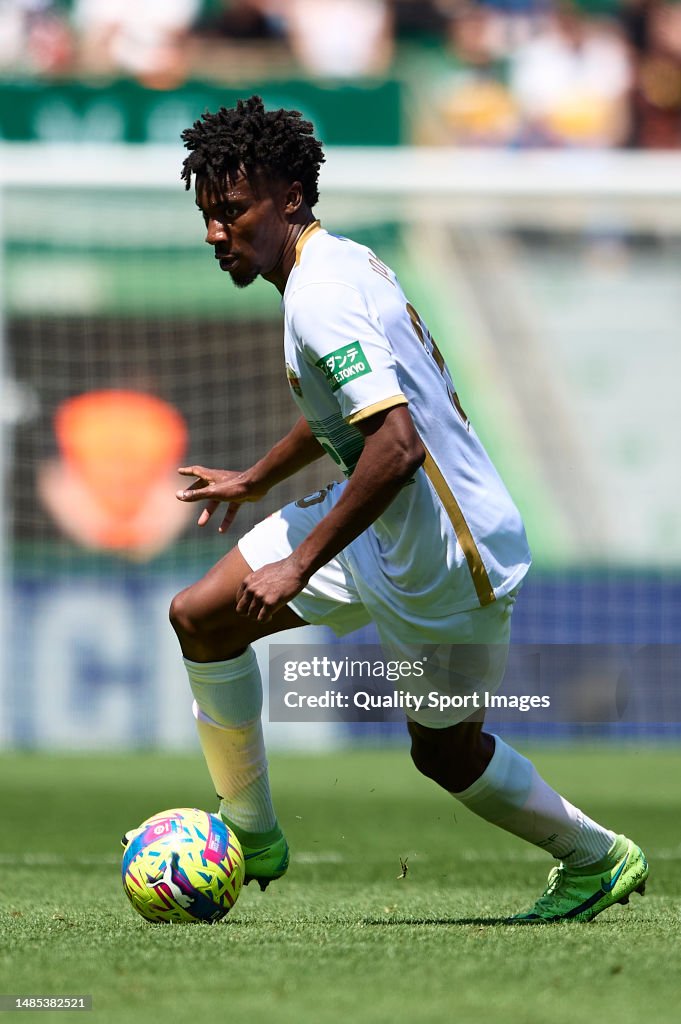 Chief Eleche John Chetauya of Elche CF runs with the ball during the LaLiga... News ...