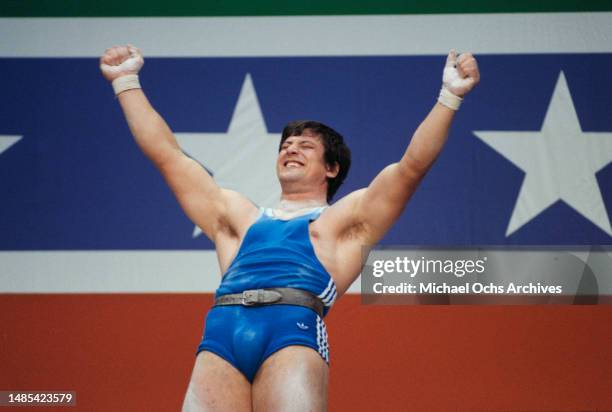 Romanian weightlifter Vasile Groapa celebrates during the men's 100 kg competition of the men's weightlifting events at the 1984 Summer Olympics, at...