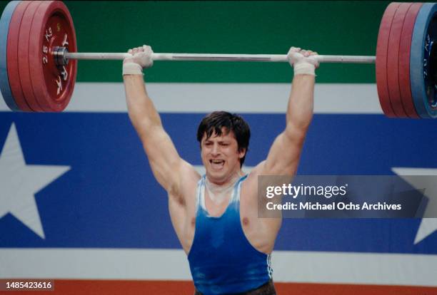 Romanian weightlifter Vasile Groapa competes in the men's 100 kg competition of the men's weightlifting events at the 1984 Summer Olympics, at the...