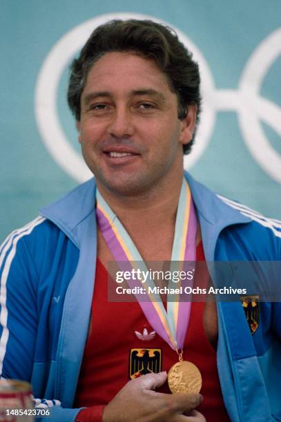 German weightlifter Rolf Milser after his gold-winning performance in the men's 100 kg competition of the men's weightlifting events at the 1984...