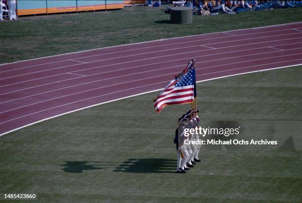Performers participating in the 'Pioneer Spirit' section of the 'Music of America' part of the opening ceremony of the 1984 Summer Olympics, held at...