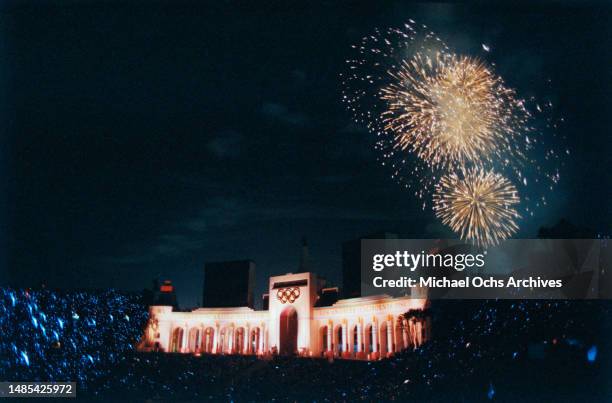 High-angle view of the firework display over the Olympic Torch Tower during the closing ceremony of the 1984 Summer Olympics, held at the Los Angeles...