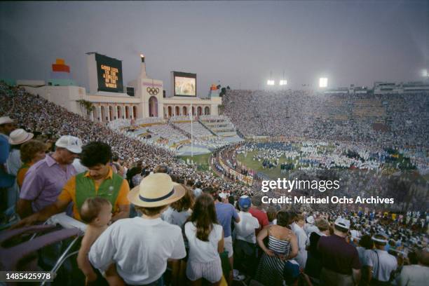 High-angle view of performers and athletes during the opening ceremony of the 1984 Summer Olympics, as seen from the upper tier of the Los Angeles...