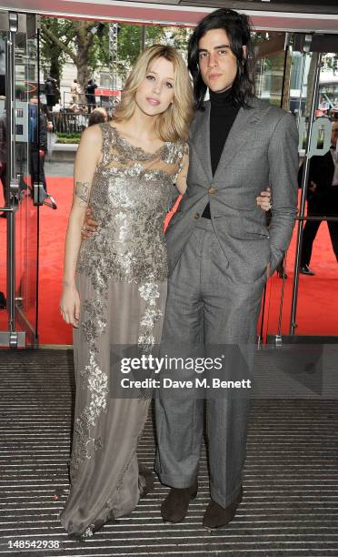 Peaches Geldof and Thomas Cohen attend the European Premiere of 'The Dark Knight Rises' at Odeon Leicester Square on July 18, 2012 in London, England.