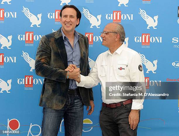 Actor Nicolas Cage and Director Claudio Gubitosi attend 2012 Giffoni Film Festival Photocall on July 18, 2012 in Giffoni Valle Piana, Italy.
