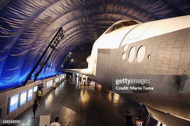 The Space Shuttle Enterprise is seen at a press preview of the Intrepid Sea, Air & Space Museum’s new Space Shuttle Pavilion on July 18, 2012 in New...