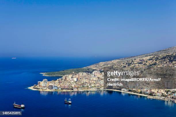 harbour town saranda, city view, popular seaside resort on the coast of the ionian sea, saranda, qark vlora, albania - sarande albania stock pictures, royalty-free photos & images