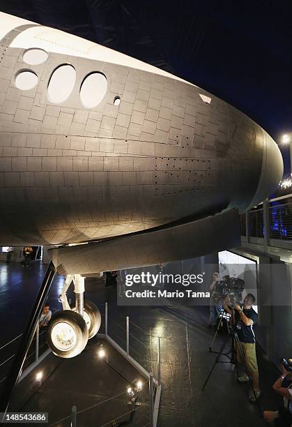 The nose of the Space Shuttle Enterprise is seen at a press preview of the Intrepid Sea, Air & Space Museum’s new Space Shuttle Pavilion on July 18,...