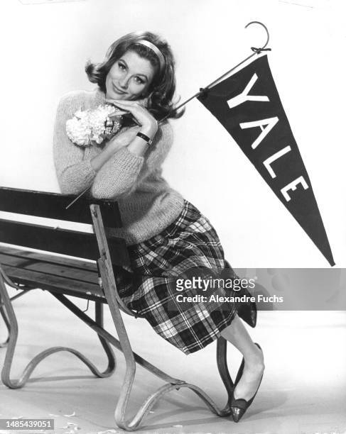 Actress Suzy Parker poses as a collegiate to promote the film 'The Interns' at Los Angeles, California in 1961