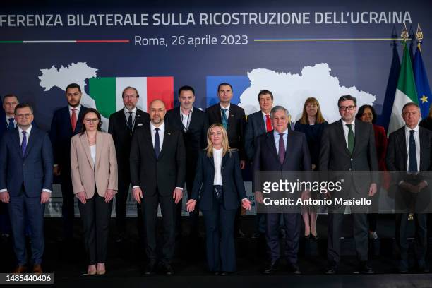 Italian Prime Minister Giorgia Meloni and Ukrainian Prime Minister Denys Shmyhal with other ministers pose for a family photo during the bilateral...