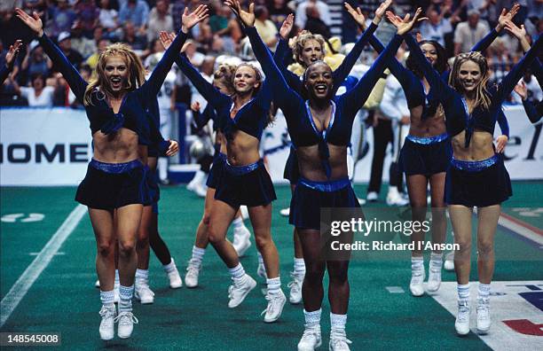 cheerleaders at arena league football (gridiron) game at gaylord entertainment centre. - dance team stock pictures, royalty-free photos & images