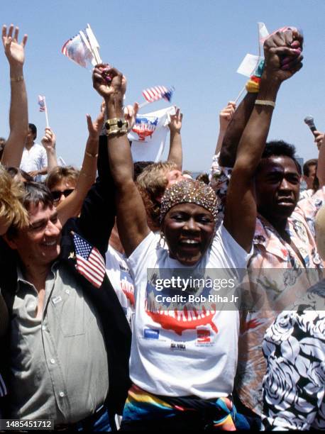 Celebrities including Raquel Welch , Dudley Moore , Cicely Tyson and Ben Vereen joined hands with millions of other people nationwide to participate...