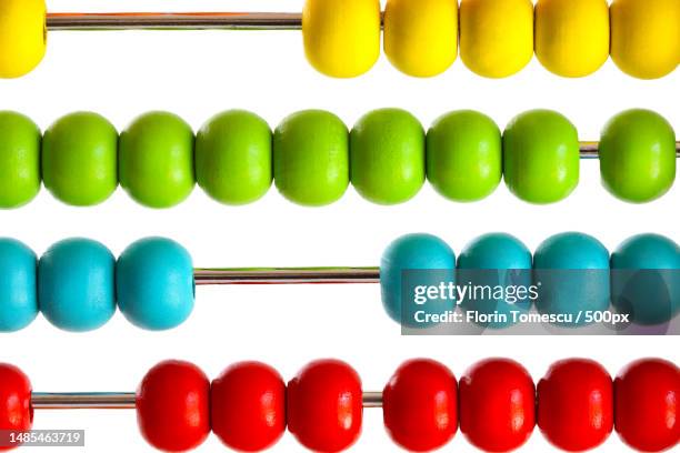 closeup of bright abacus beads on white,romania - abacus stock pictures, royalty-free photos & images