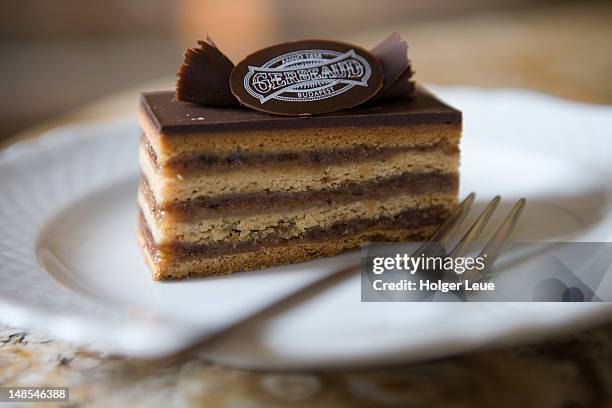 schnitte cake at gerbeaud cafe. - schnitte stock pictures, royalty-free photos & images