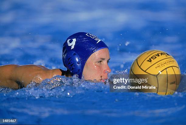 Ann Dow of the Team Canada swims with the ball during a game against Team Australia for the 2000 Holiday Cup - Women's International Water Polo...