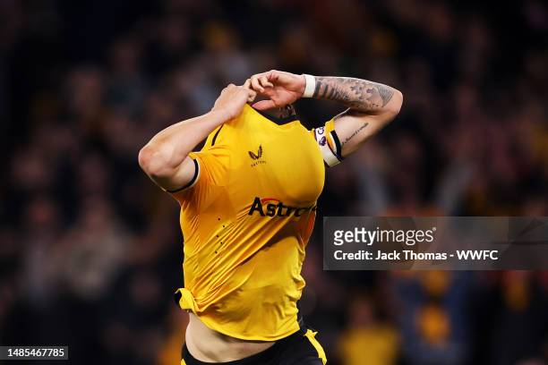Ruben Neves of Wolverhampton Wanderers celebrates after scoring his team's second goal from the penalty spot during the Premier League match between...