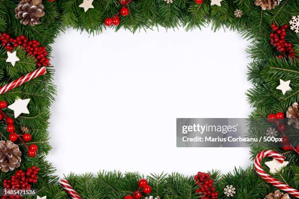 directly above shot of christmas decorations on white background,romania - nadelbaum freisteller stock-fotos und bilder