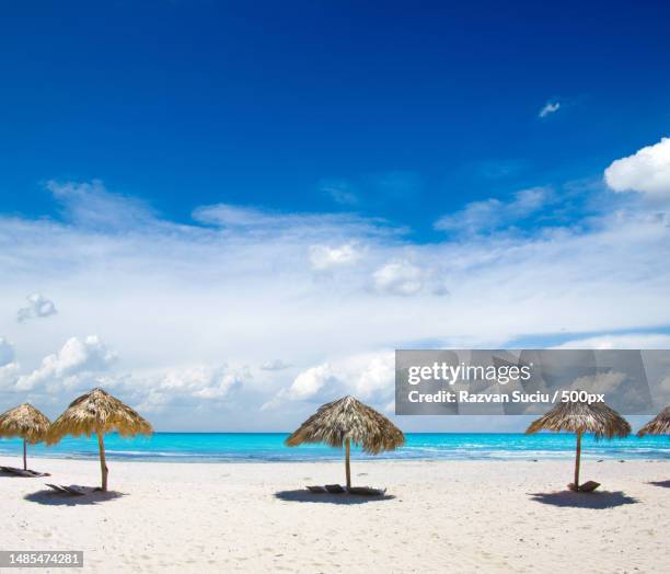 scenic view of beach against blue sky,romania - romania beach stock pictures, royalty-free photos & images