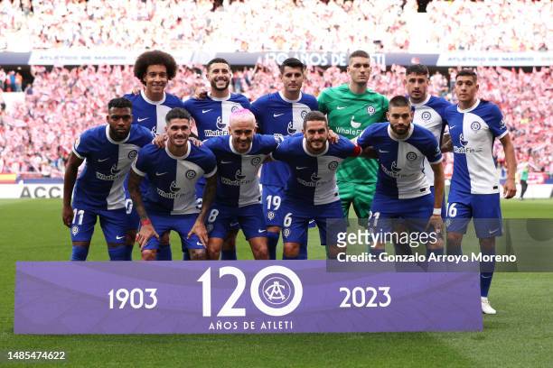 Players of Atletico Madrid pose for a team photograph wearing a tribute kit for their 120th anniversary prior to the LaLiga Santander match between...