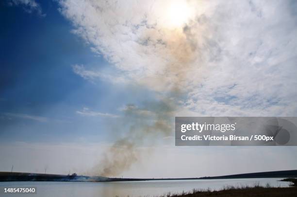 scenic view of lake against sky,romania - sulphur stock pictures, royalty-free photos & images