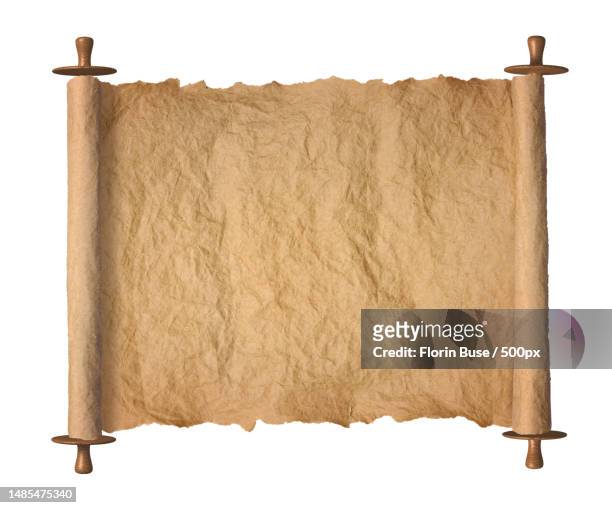 old rolled torah parchment on white background,romania - pergamena foto e immagini stock